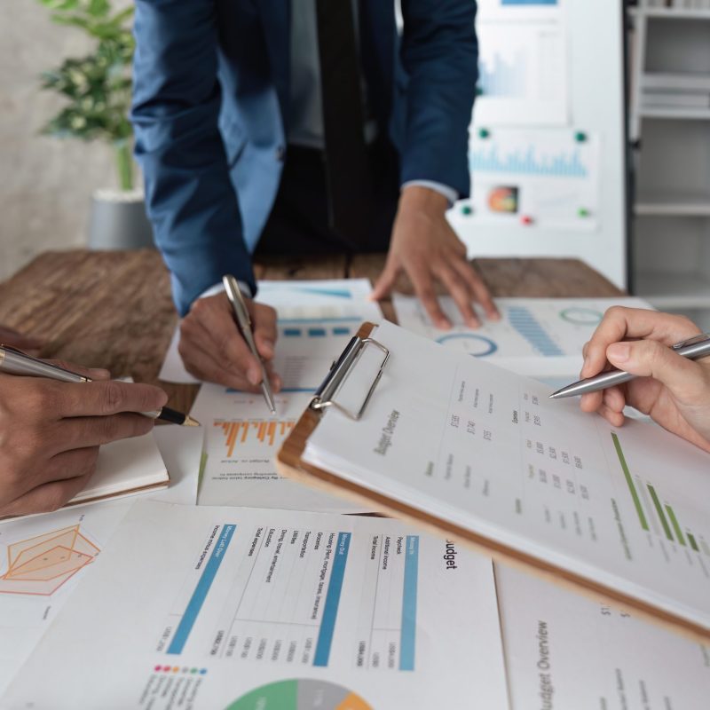 Business team meeting to , collaboration discussing working analyzing with financial data and marketing business strategy project, presentation and brainstorming to making profit of company.